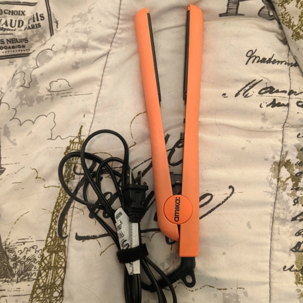 Amika flat iron -free if bundled with another item!